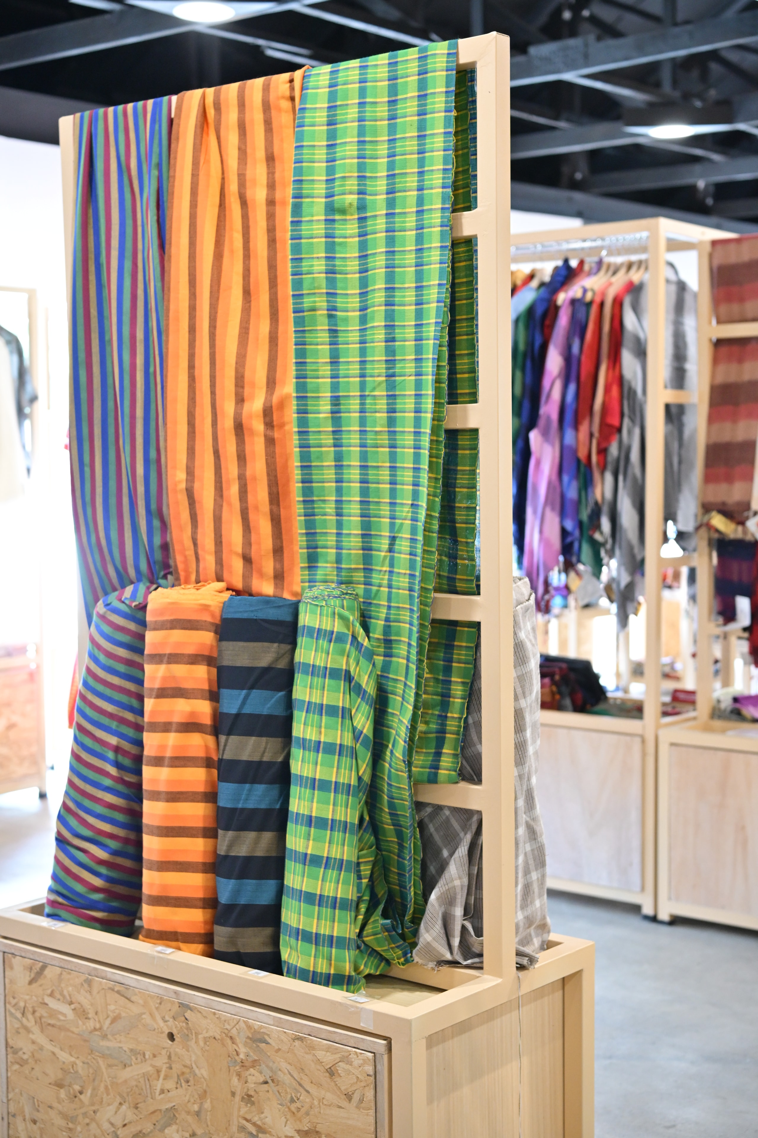 Stack of folded handwoven Philippine textiles