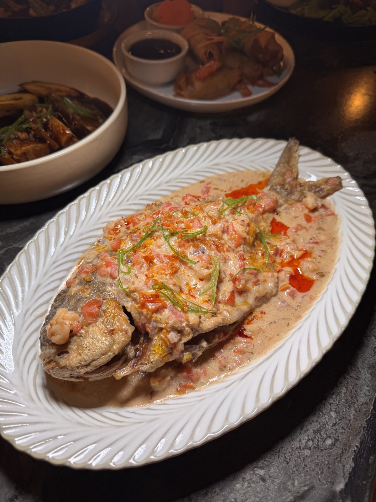 Whole Pampano Braised in Coconut Milk, Tatung's signature dish from Lola Juanita's recipe